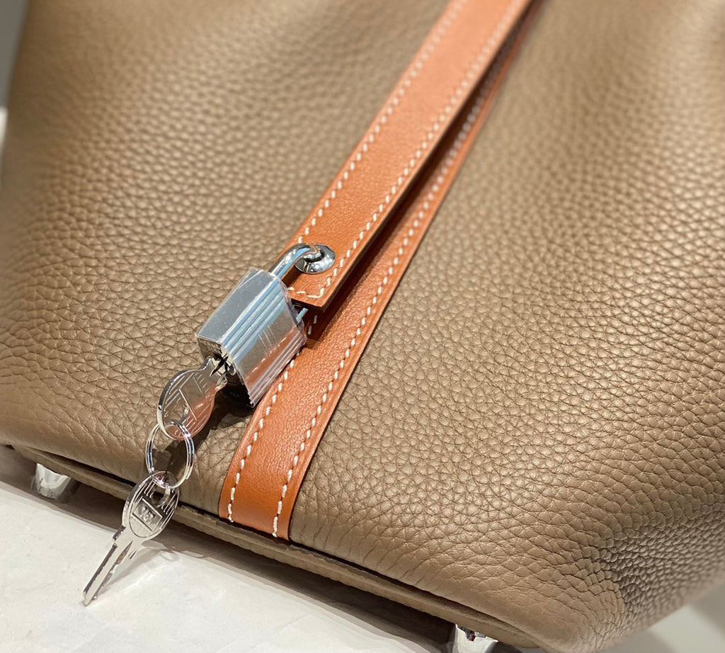 HERMES 25S PICOTIN LOCK 18 IN BURNT ORANGE AND BROWN CALFSKIN SILVER HARDWARE