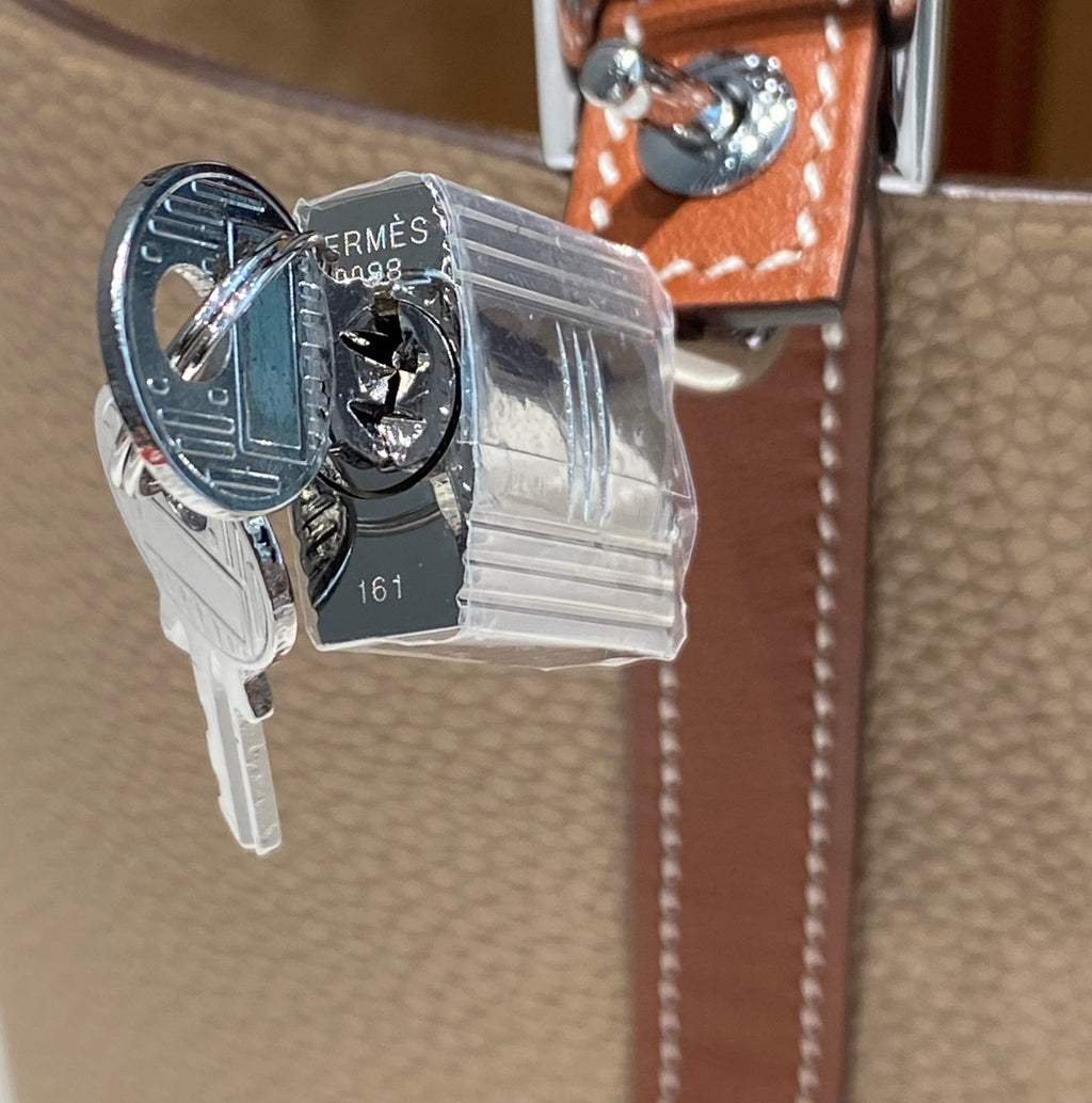 HERMES 25S PICOTIN LOCK 18 IN BURNT ORANGE AND LIGHT BROWN CALFSKIN SILVER HARDWARE
