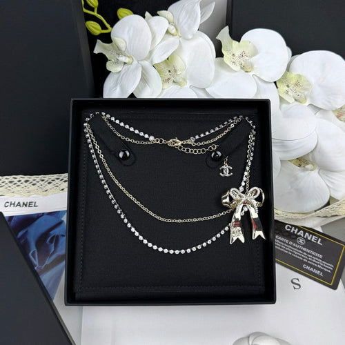 18K  Chanel 25K Bow Tie Diamond Gold Necklace