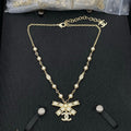 18K  Chanel Bow Tie Diamond Gold Necklace