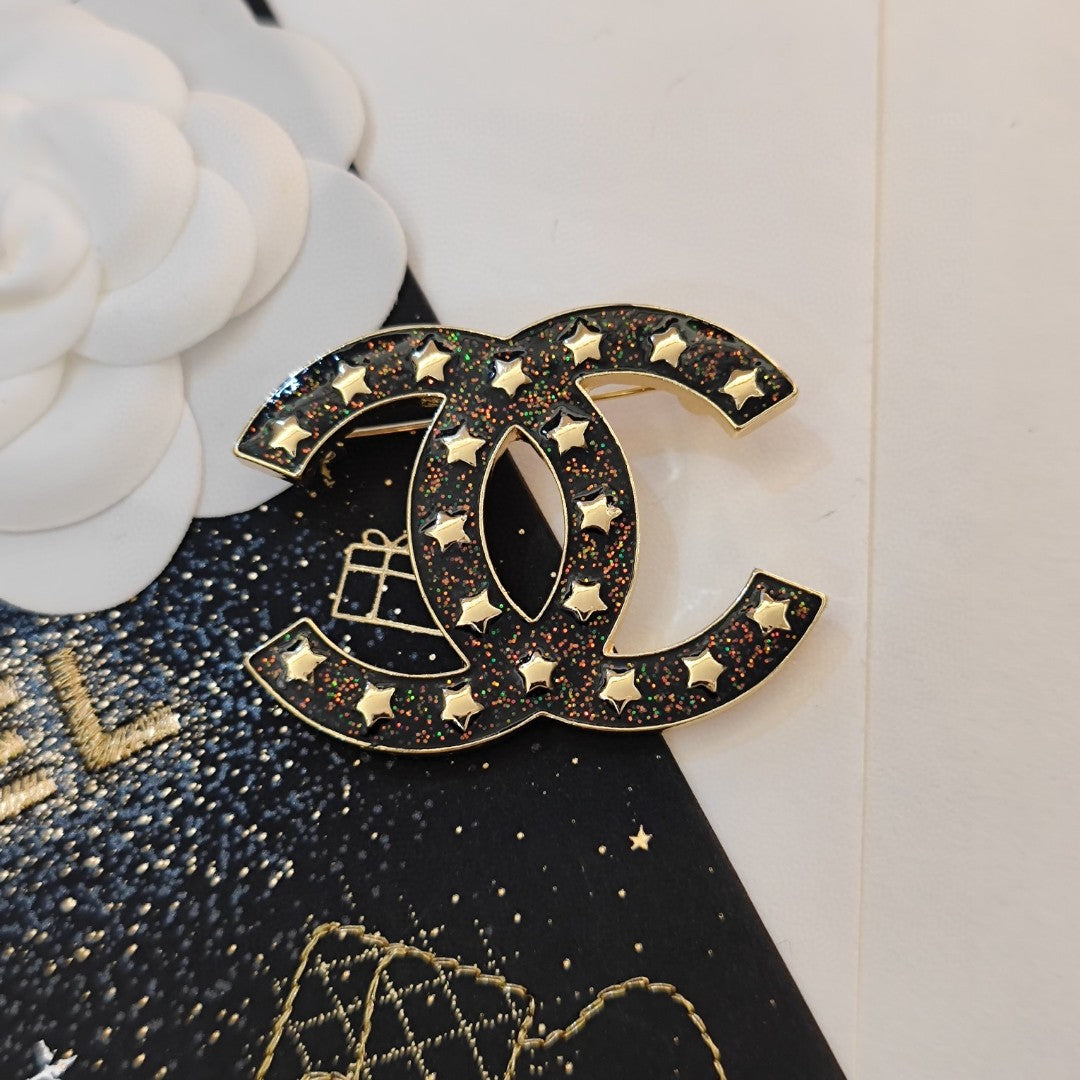 18K  Chanel Black Star Brooch