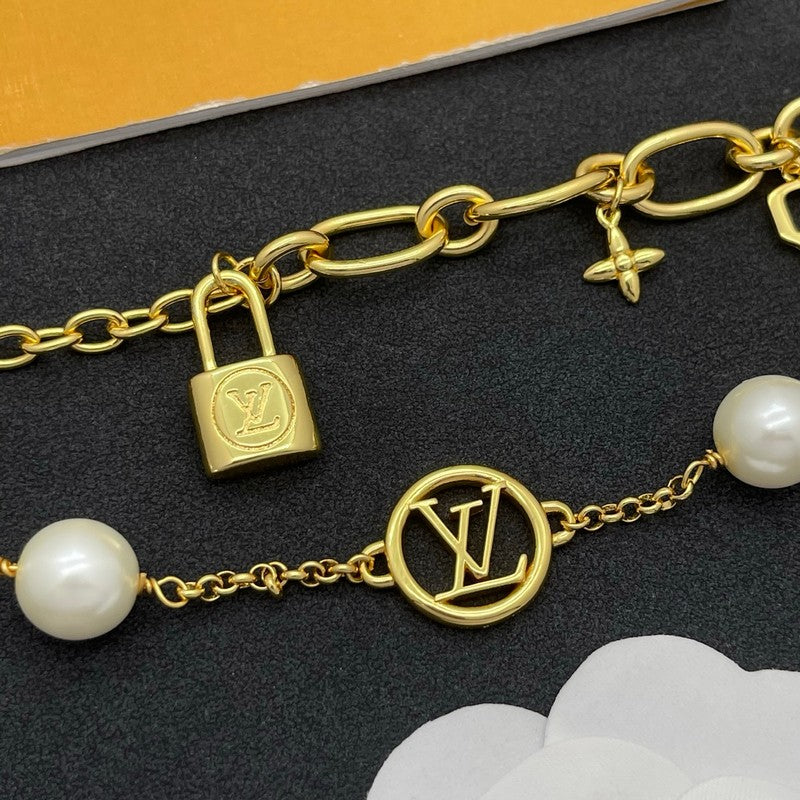 18K Louis Vuitton Pearl Lock Gold Bracelet