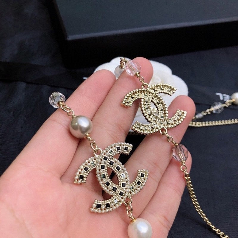 18K  Chanel Long Pearl Necklace