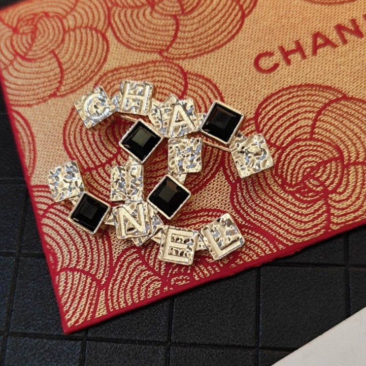 18K  Chanel Black Crystals Brooch